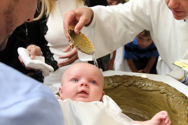 Baby being baptised